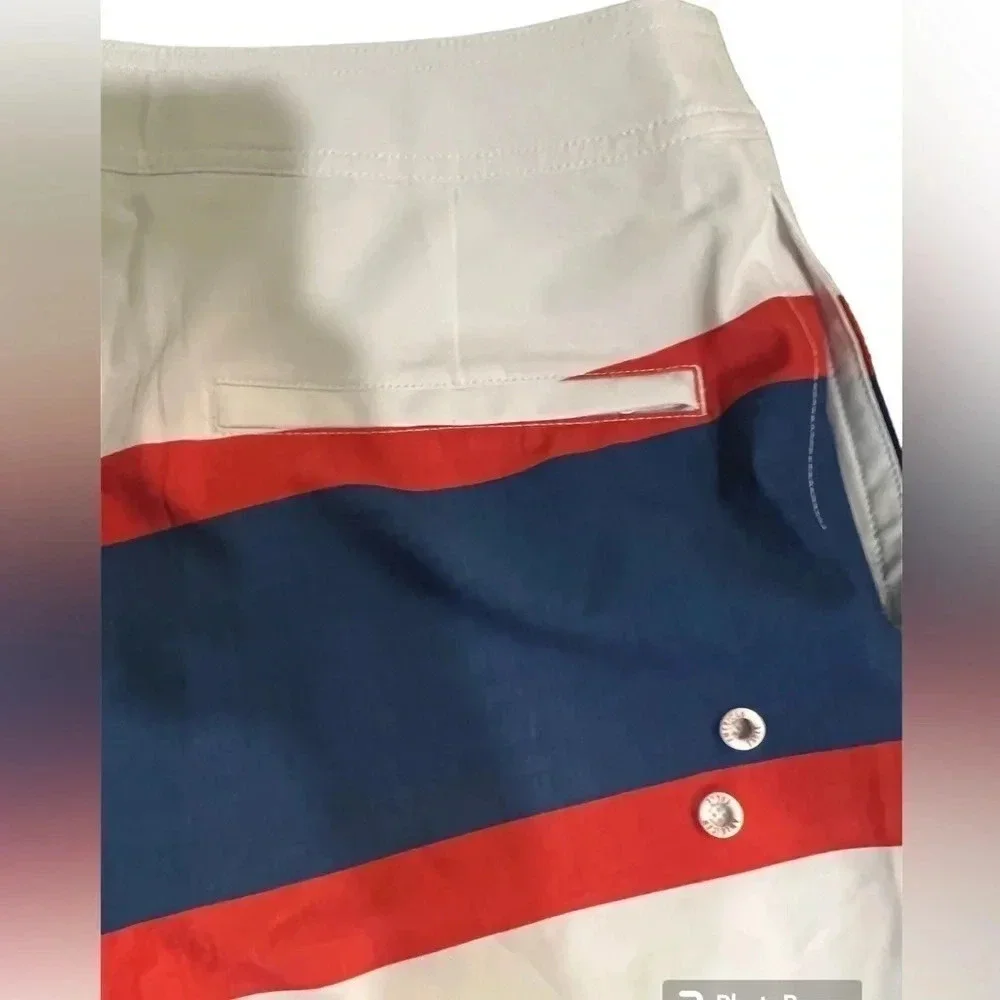 AE XS Board Shorts Brand new in white with blue and red accent colors
